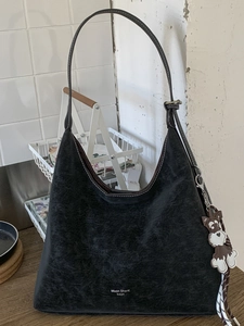Vintage dark grey tote bag with Schnauzer charm and large capacity on a table