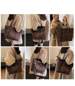 Detail view of large leopard print tote bag styled with a chic autumn camel coat