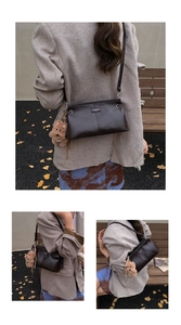 Detailed view of a dark brown glossy leather crossbody bag with a plush bear charm