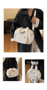 Three-way cream white pillow bag shown in crossbody and handheld styles on a model
