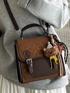 Vintage brown leopard print satchel bag with bear pendant and adjustable strap