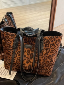 Large leopard print tote bag with black leather handles and Shiyinman brand patch