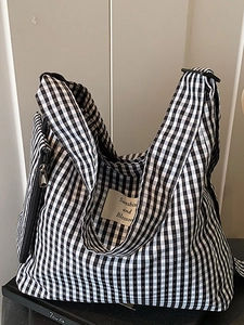 Large black and white checkered canvas tote bag with Sunshine and Blossom label