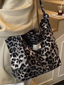 Chic leopard print canvas tote bag with large capacity and adjustable crossbody strap
