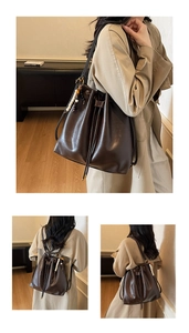 Detail of vintage coffee brown bucket bag featuring pearl charms and soft PU leather