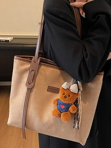 Retro khaki suede tote bag with brown leather straps and cute plush bear accessory