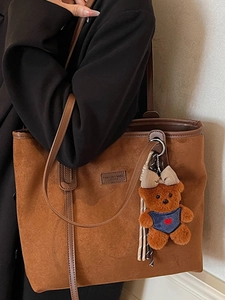 Vintage large brown suede tote bag with leather straps and cute bear charm for women