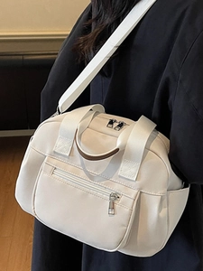 White nylon multi-pocket shoulder bag with brown leather handles for stylish women