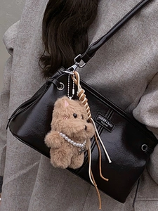 Retro dark brown glossy leather crossbody bag with cute plush bear pendant accessory