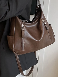 Retro dark brown PU leather hobo bag with side pockets and stylish vertical zippers