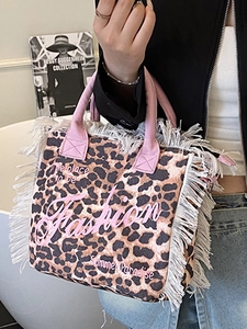 Leopard print canvas tote bag with pink straps and white fringes for beach or daily use