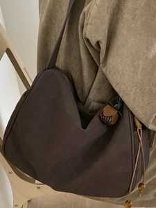 Coffee brown suede crescent underarm bag with decorative leather flower and wooden bead