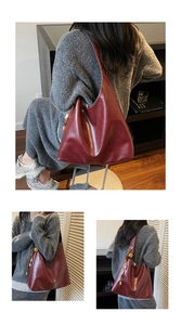 Detailed close-up of wine red faux leather tote bag with ethnic tassel and gold logo