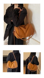 Close-up of caramel suede tote bag featuring a cylindrical design and leather strap