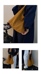 Vue détaillée du grand sac cabas jaune gingembre avec texture suédée et petit logo doré