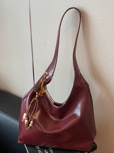 Minimalist large burgundy hobo shoulder bag with a vintage oil-wax finish and boho charm