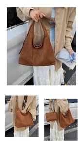 Detail of ginger brown suede hobo tote bag featuring a matching small zipper pouch
