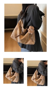 Detail of vintage brown tote bag with retro leather texture and cute teddy bear charm