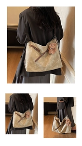 Detailed close-up of a vintage khaki canvas tote bag featuring a cute brown plush bear charm