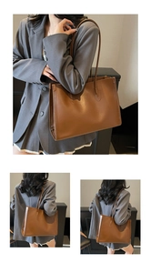 Detail of a brown matte leather tote bag showing large capacity and long shoulder straps