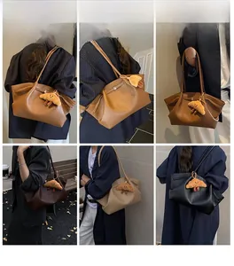 Litchi pattern leather tote bag shown in various colors with a plush croissant charm