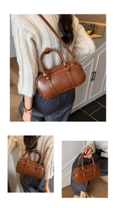 Retro brown leather Boston bag shown in hand-carry and crossbody styles with gold hardware