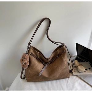 Retro brown oversized tote bag with plush bear charm and premium suede-like texture