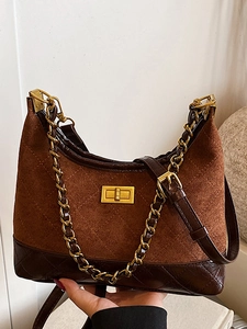 Quilted crossbody bag in brown suede and crocodile pattern leather with gold chain strap