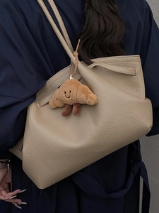 French vintage beige lychee grain leather underarm bag with cute croissant plush charm