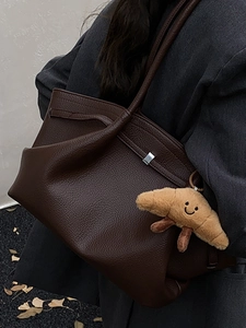 French vintage dark brown lychee leather tote bag with a cute croissant plush charm