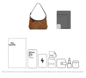 Detail view showing internal capacity of brown suede hobo bag with daily essentials