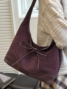 Vintage burgundy large tote bag with matte leather finish and bow detail for women