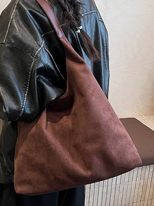 Large brown suede tote bag for women featuring a minimalist triangular bucket design for commuting