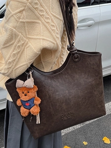 Retro coffee brown large tote bag with teddy bear pendant and matte leather finish