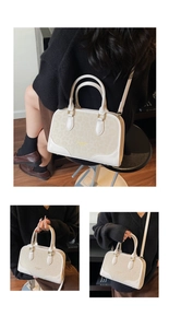 Close-up of beige boston bag with leopard print panel and gold hardware details