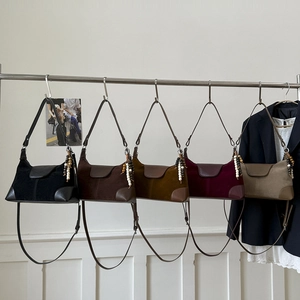 Retro suede patchwork shoulder bag with wooden beads available in five rich colors