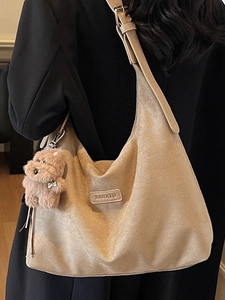 Large capacity camel suede tote bag with adjustable strap and plush puppy charm
