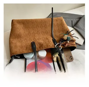 Top view of spacious caramel tote bag showing large capacity for iPad and essentials