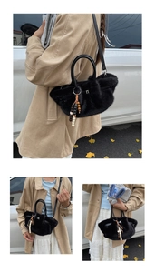 Detail of black faux fur plush handbag featuring soft texture and ethnic wood bead pendant