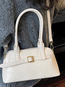 Minimalist cream shoulder bag with golden buckle and textured synthetic leather for women