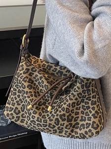 Large leopard print canvas tote bag with brown leather straps for autumn fashion