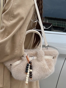 Chic beige faux fur plush handbag with leather drawstring and wooden bead charm