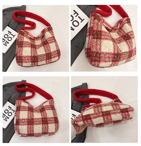 Detail of red checkered plush tote bag featuring soft furry straps and leather label