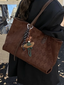 Large brown faux suede tote bag with diamond pattern and cute charms for autumn fashion
