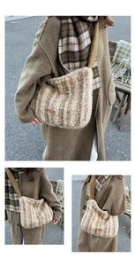 Detail of wool striped tote bag with leather label and cozy fleece shoulder strap