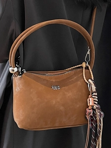 Vintage brown suede bucket bag for women with decorative scarf and silver metal hardware