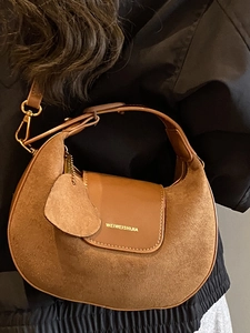 Retro brown suede crescent moon shoulder bag for women with gold hardware and flap closure
