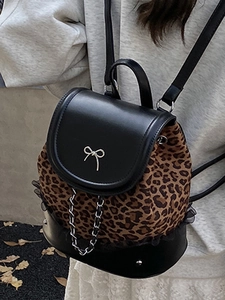 Sac à dos léopard pour femme avec bordure en dentelle et nœud en métal élégant