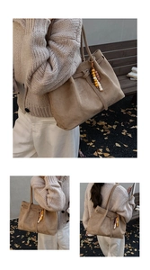 Detailaufnahme braune Wildleder-Tragetasche mit Seitenschnalle und Ethno-Perlenquaste