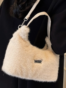Chic cream faux fur crossbody bag with white leather strap and silver nameplate for women